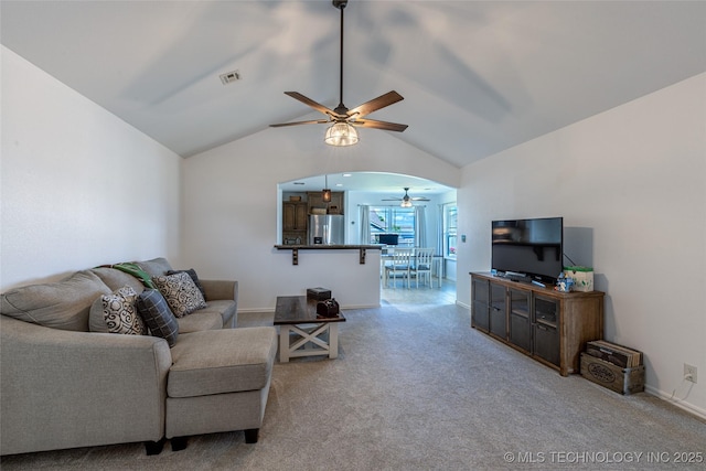 11042 N 120th Ave E, Owasso, OK 74055 - carpeted living room featuring ceiling fan and lofted ceiling