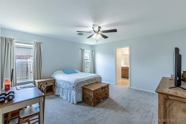 11042 N 120th Ave E, Owasso, OK 74055 - bedroom featuring light colored carpet, an office area, ceiling fan, and ensuite bath