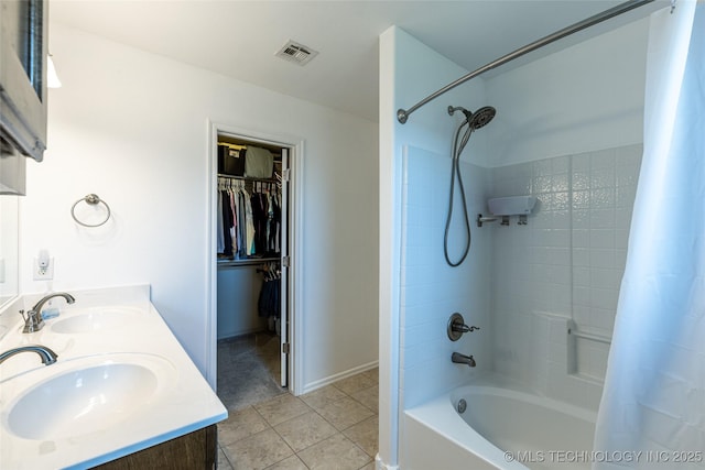 11042 N 120th Ave E, Owasso, OK 74055 - bathroom with shower / bath combo, tile patterned flooring, double vanity, and a spacious closet
