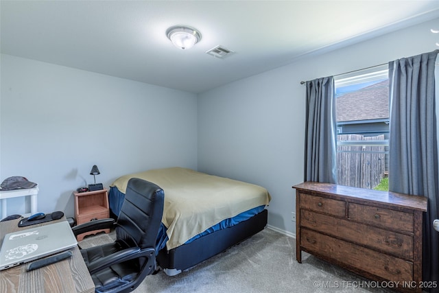 11042 N 120th Ave E, Owasso, OK 74055 - carpeted bedroom featuring baseboards and a desk