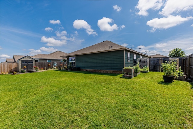 11042 N 120th Ave E, Owasso, OK 74055 - back of house with a fenced backyard and a storage unit