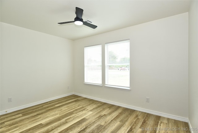 217 E Virgin St, Tulsa, OK 74106 - spare room with light wood-style floors and a ceiling fan