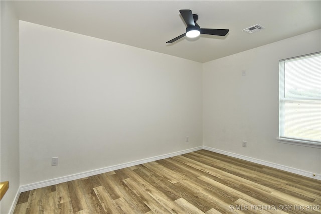 217 E Virgin St, Tulsa, OK 74106 - empty room featuring wood finished floors and a ceiling fan