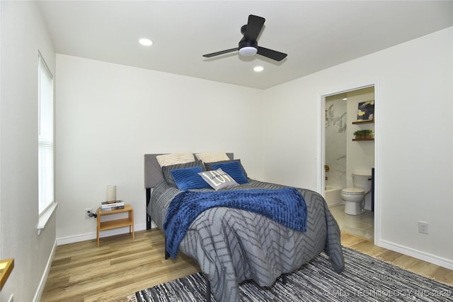 217 E Virgin St, Tulsa, OK 74106 - bedroom with light wood-type flooring, ensuite bathroom, recessed lighting, and ceiling fan