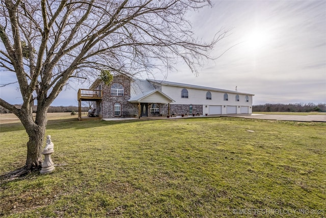 1522 Burney Cemetary, Calera, OK 74730 - view of front of home featuring a garage, concrete driveway, a front lawn, and brick siding