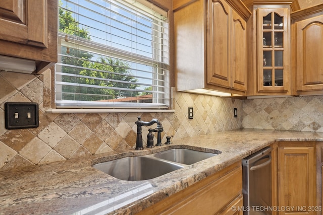 8483 N 68th E Ave, Owasso, OK 74055 - kitchen featuring glass insert cabinets, decorative backsplash, and brown cabinets