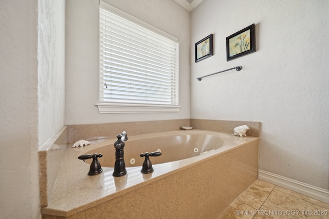 8483 N 68th E Ave, Owasso, OK 74055 - bathroom with a whirlpool tub and tile patterned flooring