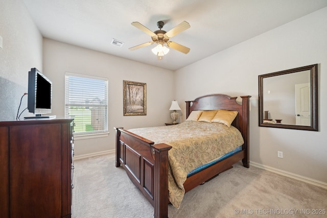 8483 N 68th E Ave, Owasso, OK 74055 - bedroom featuring light colored carpet and a ceiling fan