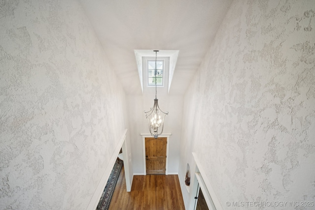 8483 N 68th E Ave, Owasso, OK 74055 - stairs featuring wood finished floors and a chandelier