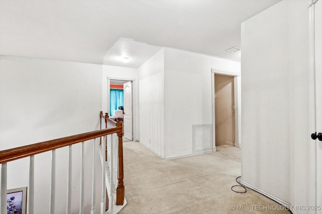1720 S Juniper Ave, Broken Arrow, OK 74012 - corridor featuring an upstairs landing and light carpet