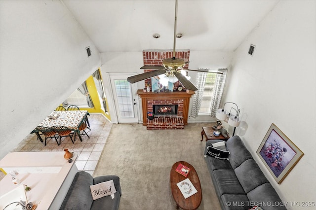 1720 S Juniper Ave, Broken Arrow, OK 74012 - living area with a ceiling fan, healthy amount of natural light, a fireplace, and carpet