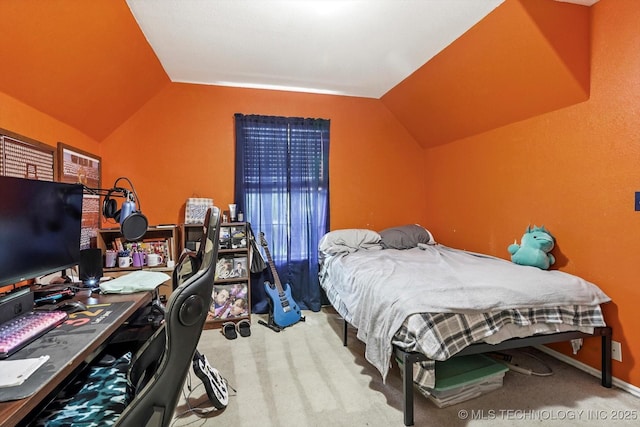 1720 S Juniper Ave, Broken Arrow, OK 74012 - bedroom with vaulted ceiling, carpet flooring, and a desk