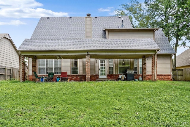 1720 S Juniper Ave, Broken Arrow, OK 74012 - rear view of house with brick siding, a chimney, and roof with shingles