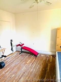 213 W Pine St, Coweta, OK 74429 - miscellaneous room with wood finished floors and a ceiling fan