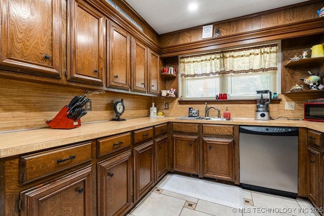 2528 W Commercial St, Broken Arrow, OK 74012 - kitchen featuring stainless steel dishwasher, open shelves, light countertops, light tile patterned flooring, and tasteful backsplash