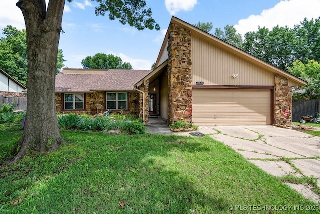 2528 W Commercial St, Broken Arrow, OK 74012 - mid-century home with stone siding, an attached garage, and driveway
