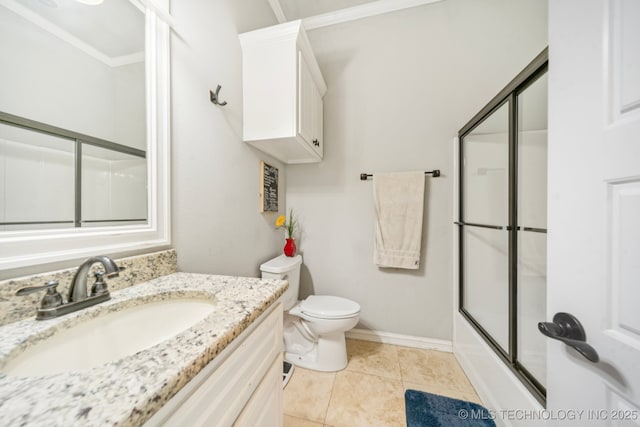 905 W Elmira St, Broken Arrow, OK 74012 - full bathroom with vanity, shower / bath combination with glass door, and tile patterned floors