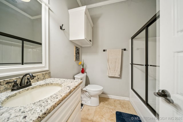 905 W Elmira St, Broken Arrow, OK 74012 - full bathroom with vanity, combined bath / shower with glass door, and tile patterned floors