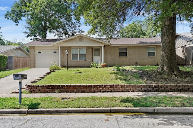 16429 E 1st St, Tulsa, OK 74108 - ranch-style house featuring a garage, brick siding, and concrete driveway