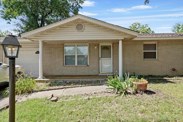 16429 E 1st St, Tulsa, OK 74108 - ranch-style home featuring an attached garage and brick siding