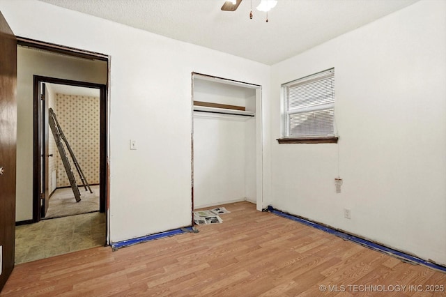16429 E 1st St, Tulsa, OK 74108 - unfurnished bedroom with light wood-style floors, a closet, and ceiling fan