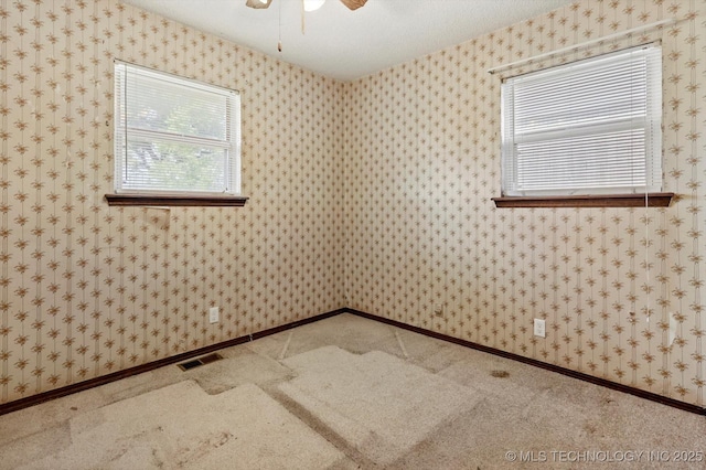 16429 E 1st St, Tulsa, OK 74108 - carpeted spare room featuring ceiling fan