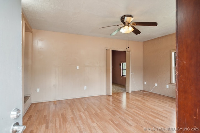 20910 Blackjack Trl, Kellyville, OK 74039 - unfurnished room with a ceiling fan and wood finished floors