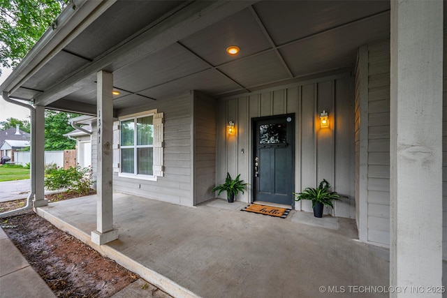 1341 Alvera Ln, Wynnewood, OK 73098 - doorway to property featuring a porch and board and batten siding