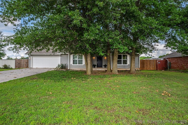 1341 Alvera Ln, Wynnewood, OK 73098 - view of property hidden behind natural elements with concrete driveway and an attached garage