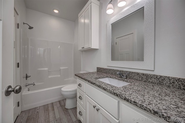 1341 Alvera Ln, Wynnewood, OK 73098 - bathroom with vanity, shower / washtub combination, wood finished floors, and recessed lighting