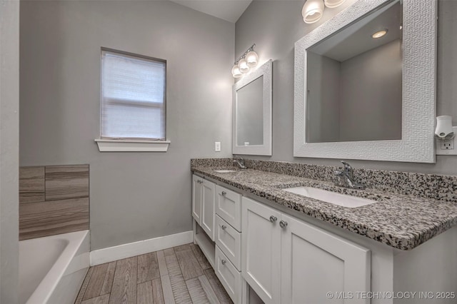 1341 Alvera Ln, Wynnewood, OK 73098 - bathroom with double vanity and a bath