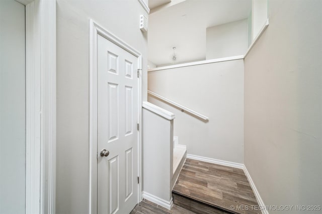 5743 E 72nd Pl Unit 11, Tulsa, OK 74136 - stairway with wood finished floors