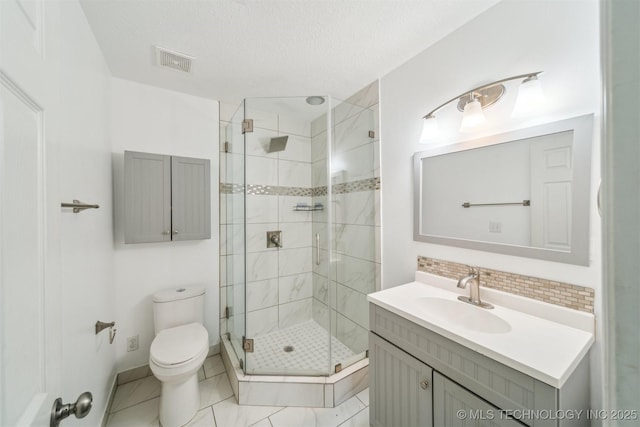 5743 E 72nd Pl Unit 11, Tulsa, OK 74136 - bathroom featuring vanity, a stall shower, and tasteful backsplash