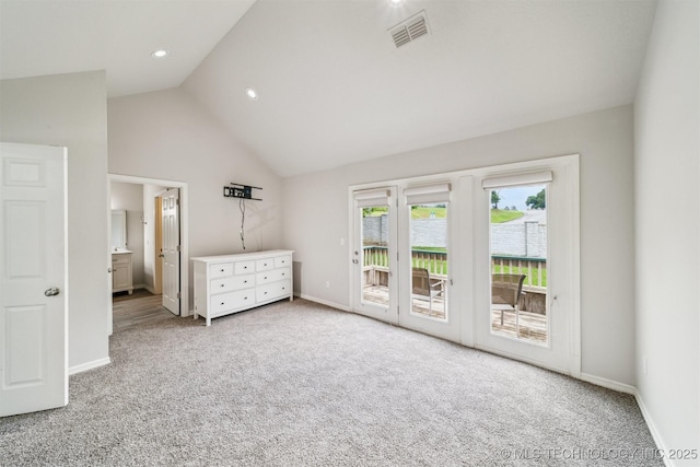 5743 E 72nd Pl Unit 11, Tulsa, OK 74136 - unfurnished bedroom with carpet, access to exterior, lofted ceiling, ensuite bathroom, and recessed lighting