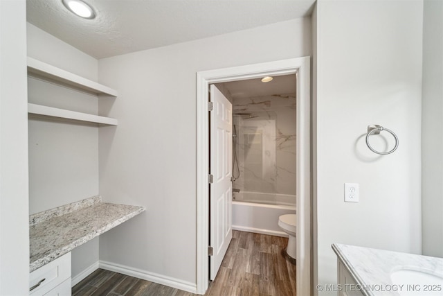 5743 E 72nd Pl Unit 11, Tulsa, OK 74136 - full bath featuring wood finished floors, vanity, shower / bathtub combination, and recessed lighting