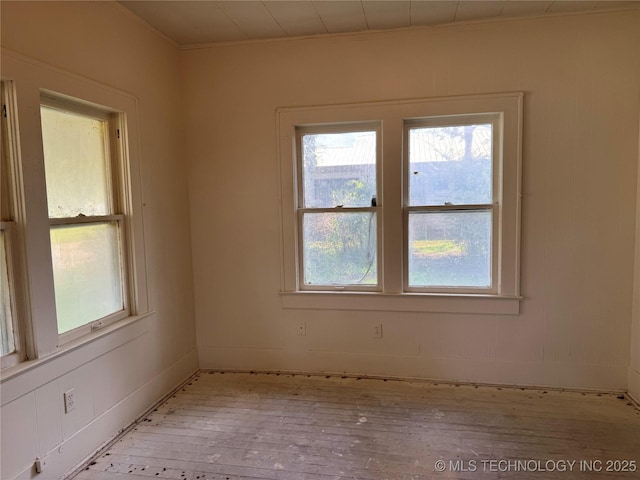 804 N Oklahoma St, Okmulgee, OK 74447 - spare room with light wood-type flooring and baseboards