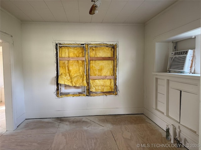 804 N Oklahoma St, Okmulgee, OK 74447 - spare room featuring ornamental molding and baseboards
