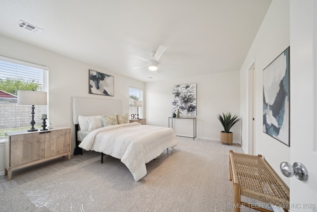 2211 E Concord Pl, Broken Arrow, OK 74012 - bedroom with light colored carpet and ceiling fan