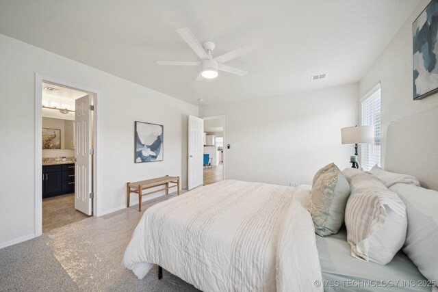 2211 E Concord Pl, Broken Arrow, OK 74012 - bedroom with light carpet, ceiling fan, and ensuite bathroom