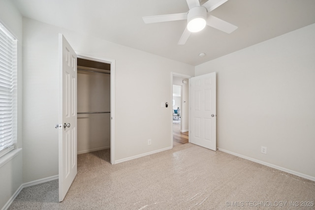 2211 E Concord Pl, Broken Arrow, OK 74012 - unfurnished bedroom with carpet flooring, a closet, multiple windows, and ceiling fan