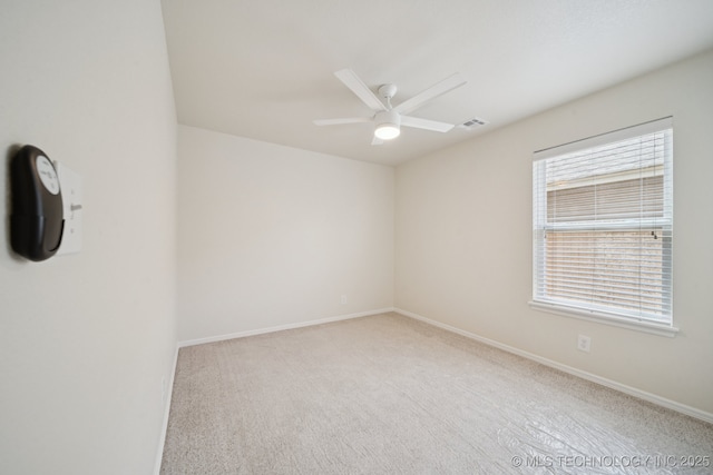 2211 E Concord Pl, Broken Arrow, OK 74012 - carpeted spare room featuring a ceiling fan and baseboards