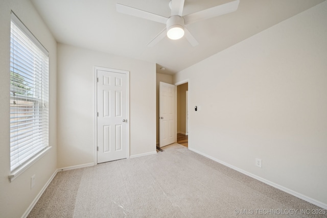 2211 E Concord Pl, Broken Arrow, OK 74012 - unfurnished bedroom with light carpet and a ceiling fan