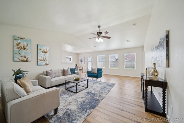 2211 E Concord Pl, Broken Arrow, OK 74012 - living area featuring light wood finished floors, a ceiling fan, and vaulted ceiling