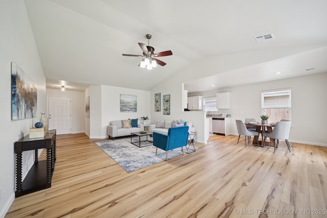 2211 E Concord Pl, Broken Arrow, OK 74012 - living room with vaulted ceiling, light wood finished floors, and a ceiling fan