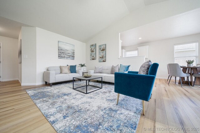 2211 E Concord Pl, Broken Arrow, OK 74012 - living area featuring light wood-type flooring and vaulted ceiling