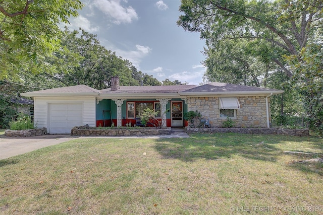 583 S Joplin Ave, Tulsa, OK 74112 - single story home with a garage, a front lawn, stone siding, a chimney, and driveway