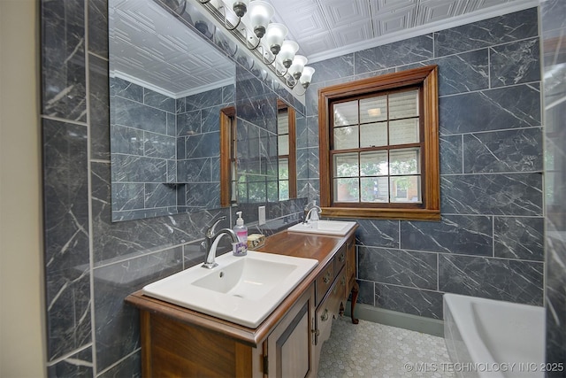 583 S Joplin Ave, Tulsa, OK 74112 - full bathroom featuring tile walls, double vanity, a tub, and crown molding