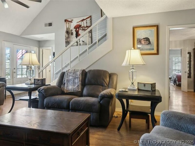 31990 S 624th Pl Unit 48, Grove, OK 74344 - living area with wood finished floors, ceiling fan, plenty of natural light, and lofted ceiling