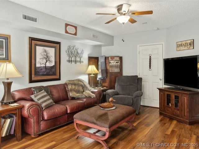 31990 S 624th Pl Unit 48, Grove, OK 74344 - living area featuring ceiling fan and wood finished floors