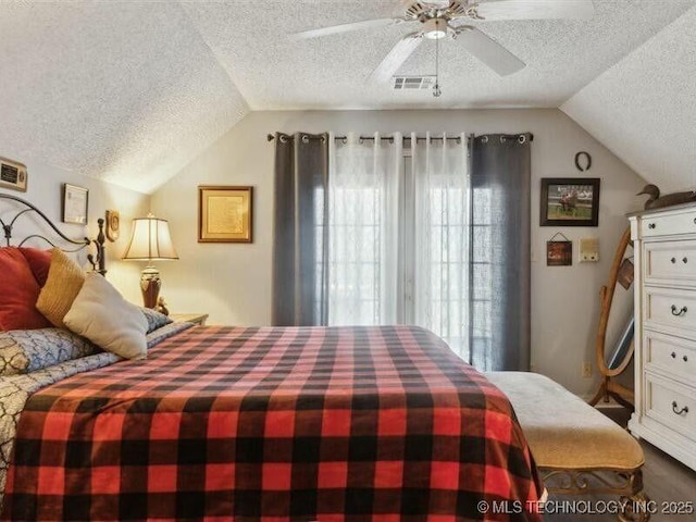 31990 S 624th Pl Unit 48, Grove, OK 74344 - bedroom featuring a textured ceiling, lofted ceiling, multiple windows, and a ceiling fan